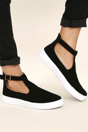 Amp up your street chic style with the Anna Black Nubuck T-Strap Sneakers! These...