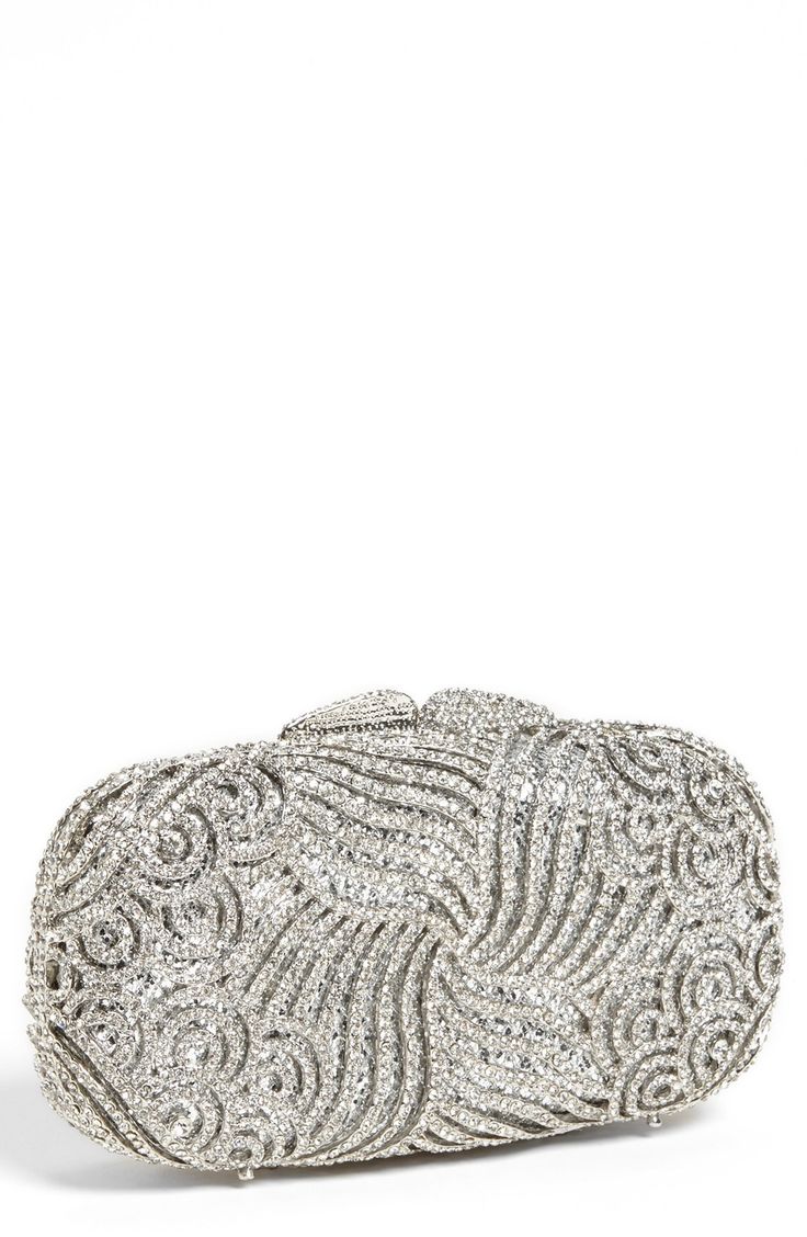 This sparkly crystal swirl clutch is fit for a princess.