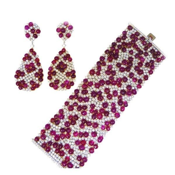 Exquisite Flexible Natural Burma Ruby Bracelet and Earrings en S. USA, 21st cent...