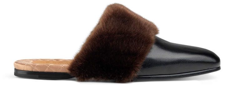 Leather and synthetic fur slipper