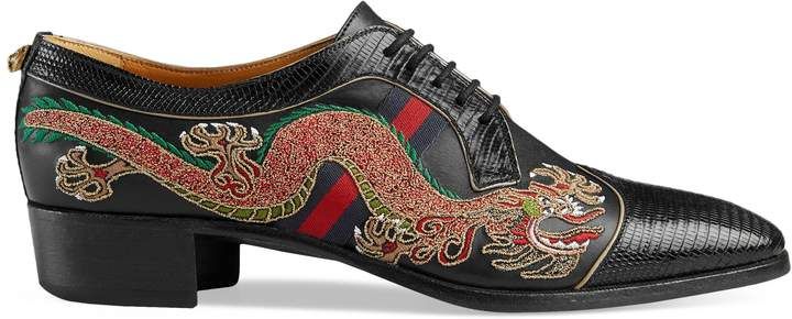 Leather lace-up shoe with dragon