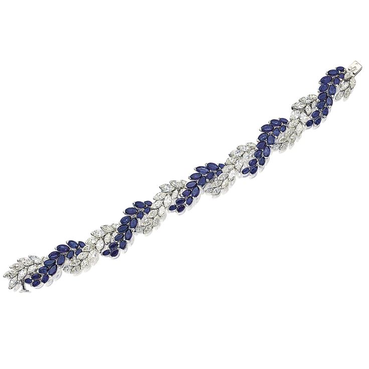 Sapphire and Diamond Bracelet Designed as two intertwined rows of numerous marqu...