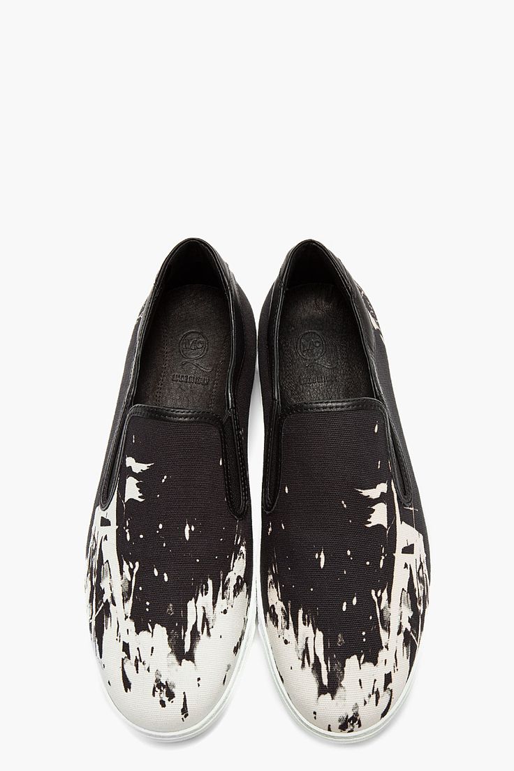 MCQ ALEXANDER MCQUEEN Black textile and leather white-splattered slip-ons