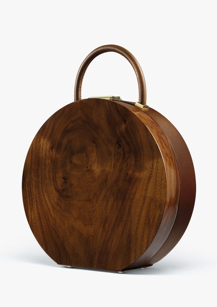 :: BUMI. Gorgeous brown purse channeling old hat box. Brilliant. looooooove it