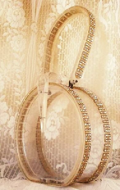 clear round purse with gold edging