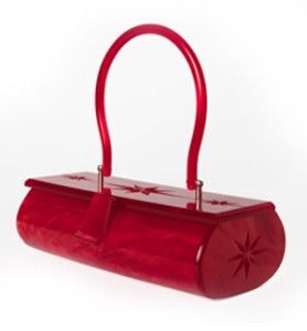 Red lucite by Lux De Ville...a unnecessary necessity every stylish chique woman ...
