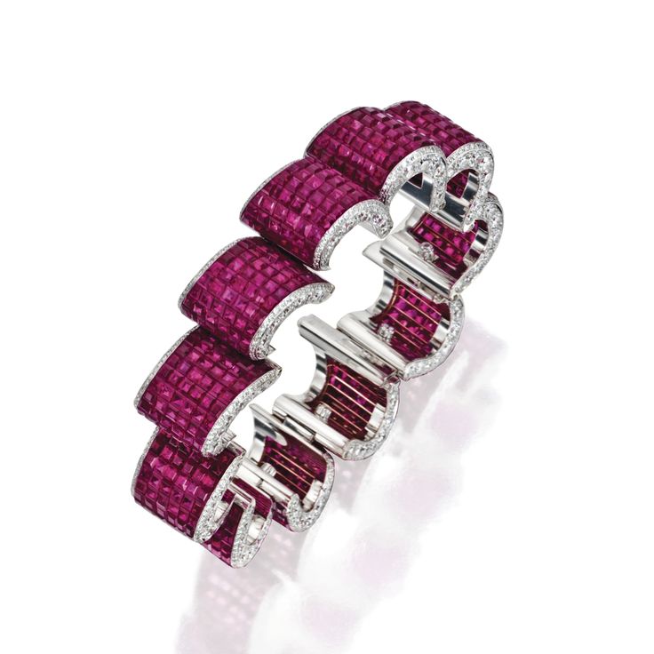 18 KARAT WHITE GOLD, INVISIBLY-SET RUBY AND DIAMOND BRACELET, ALETTO BROTHERS. T...