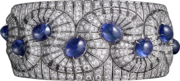 CARTIER. Bracelet - platinum, twelve cabochon-cut sapphires totaling 35.44 carat...