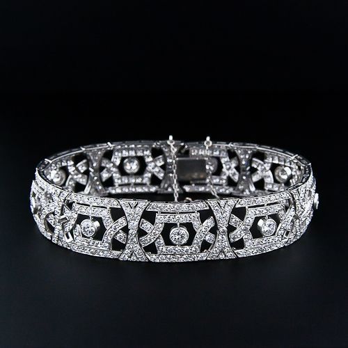 French Art Deco Platinum Diamond Bracelet with open work design. 12.0 cttw, 488 ...