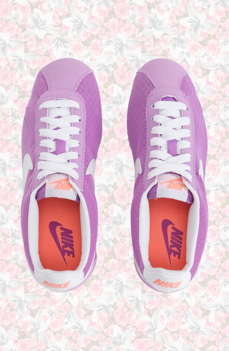 Kick back in classic '70s running style with these cute fuchsia Nikes.