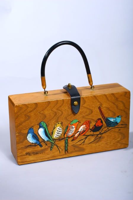 I have this Enid Collins bird bag. Nice because I don't have to worry about ...