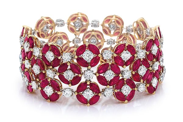 Cellini Jewelers Ruby and Diamond Bracelet. Marquis shapes rubies surround round...