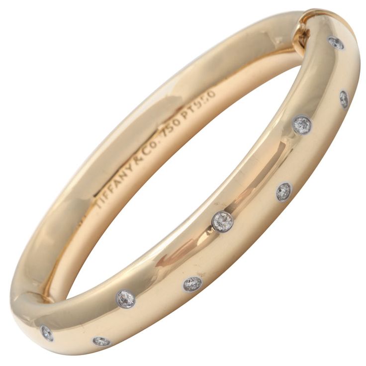 TIFFANY and Co. Gold And Diamond Bangle Bracelet