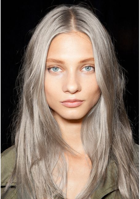 Silver long straigth hairstyle for women. Long hair with waves. Beauty trends.