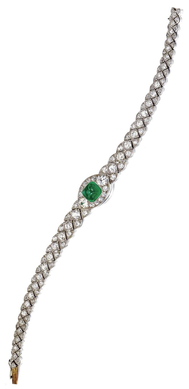 EMERALD AND DIAMOND BRACELET, CIRCA 1920. Designed as a central navette-shaped l...