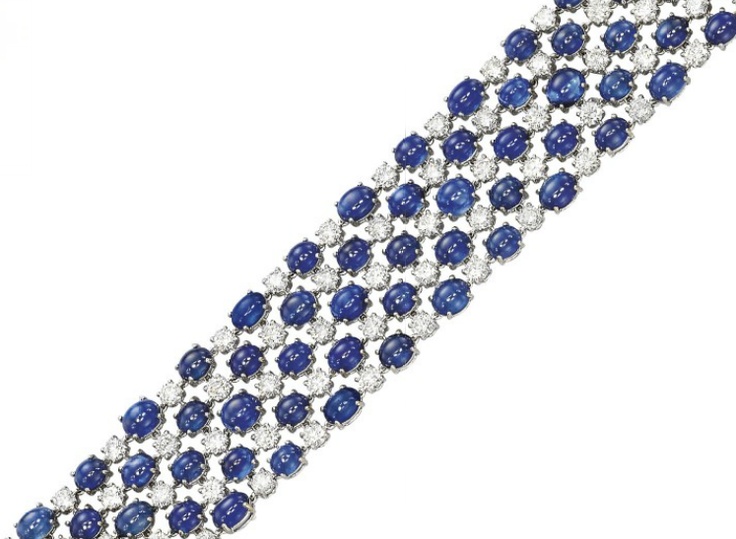 A SAPPHIRE AND DIAMOND BRACELET, BY BVLGARI The highly flexible band designed as...