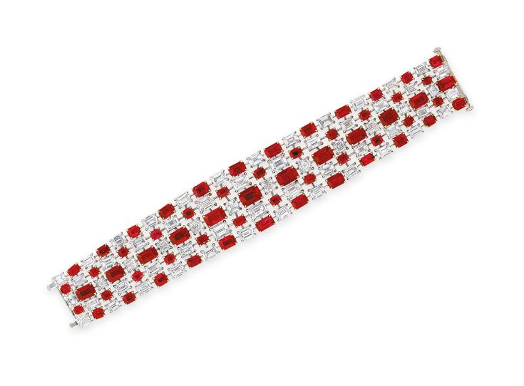A SUPERB RUBY AND DIAMOND BRACELET, BY FAIDEE. The five-row highly articulated b...