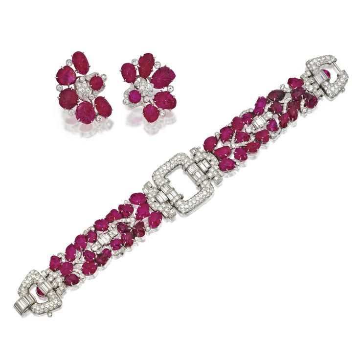 Ruby, diamond and platinum suite, comprising of a bracelet and a pair of earclip...