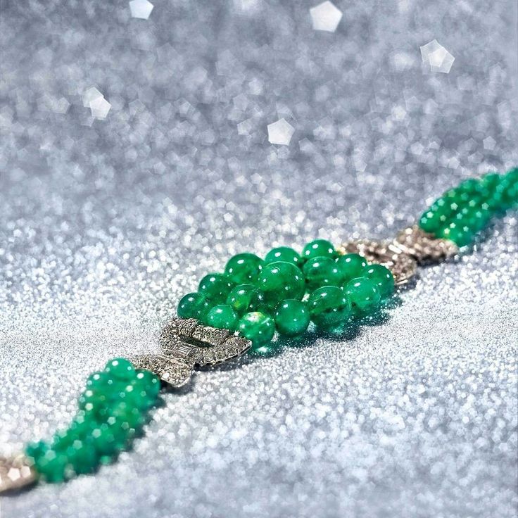 This Art Deco emerald bead and diamond bracelet, lot 74 from the London South Ke...