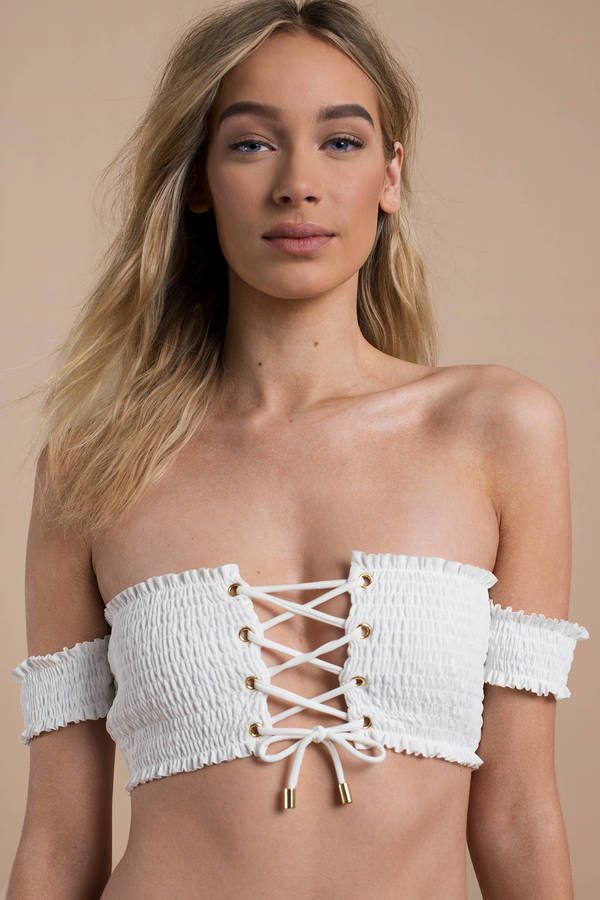 Our Adore Smocked Off Shoulder Bikini Top features a bandeau fit and lace up det...