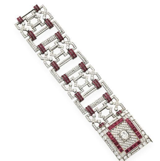 A DIAMOND AND RUBY BRACELET, BY HENNELL