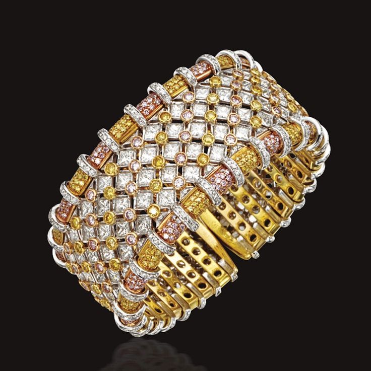 Best Diamond Bracelets : DIAMOND BANGLE-BRACELET. The sprung cuff of lattice design set with 33 square mo