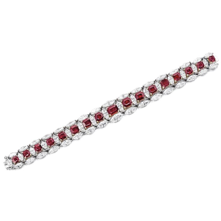 Ruby and Diamond Bracelet Set with seventeen graduated octagonal rubies weighing...