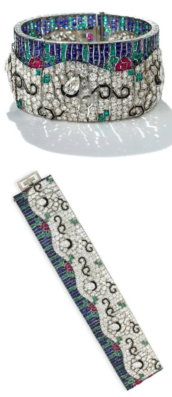 A remarkable Art Deco diamond and multi-gem wave bracelet by Rubel Freres. Circa...