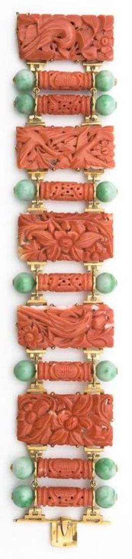 An Art Deco gold, carved coral and jade bracelet, by Grivotet and Beleau, Maison...