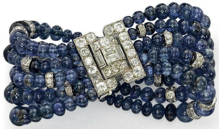 An Art Deco sapphire and diamond bracelet by Cartier. The five rows of graduated...