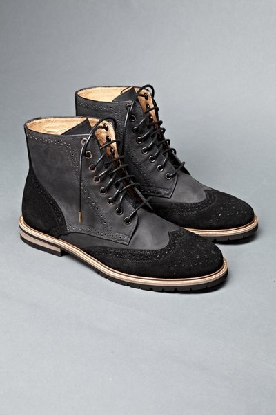 Black Suede/Goat Leather wingtip boot with oil finish. Worker last, mixed rubber...
