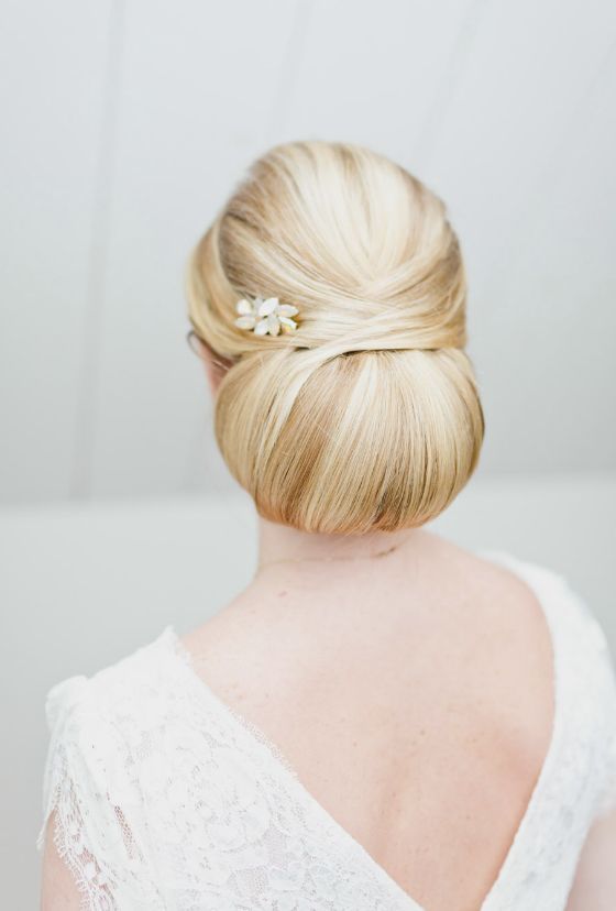 Low Twisted Sleek Bun Wedding Hairstyle - MODwedding