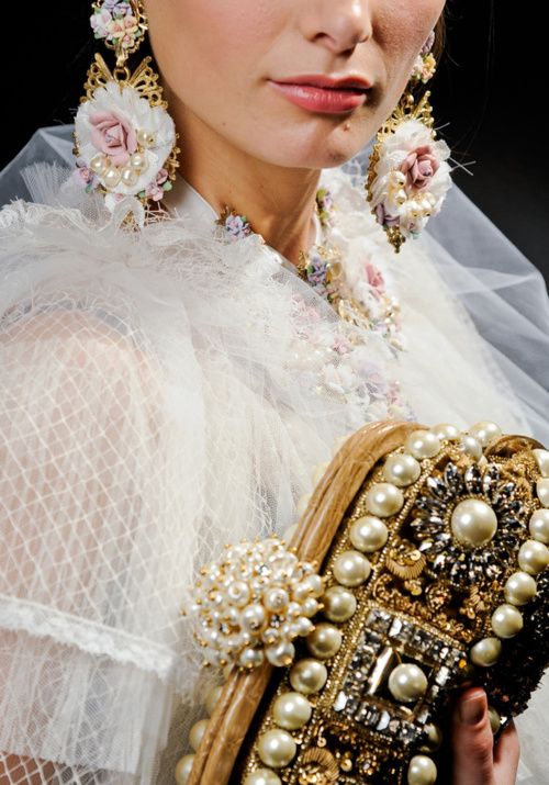 Earrings and clutch backstage at Dolce & Gabbana, Fall 2012. V