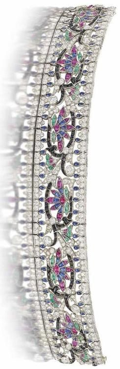 An Art Deco diamond and gem-set bracelet, by Van Cleef & Arpels. The broad strap...
