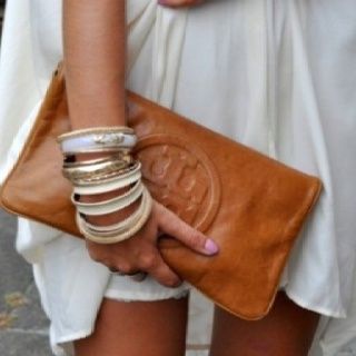 Luv this leather Tory Burch clutch!