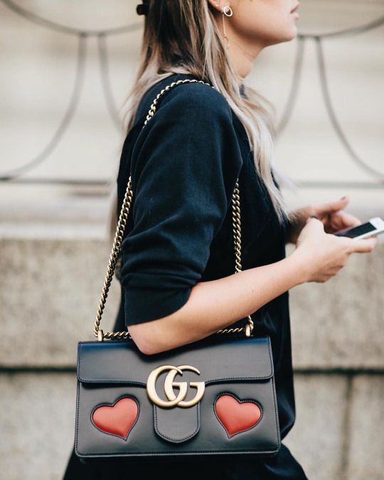 Danielle Bernstein wearing the Gucci GG Marmont Heart bag at New York Fashion We...