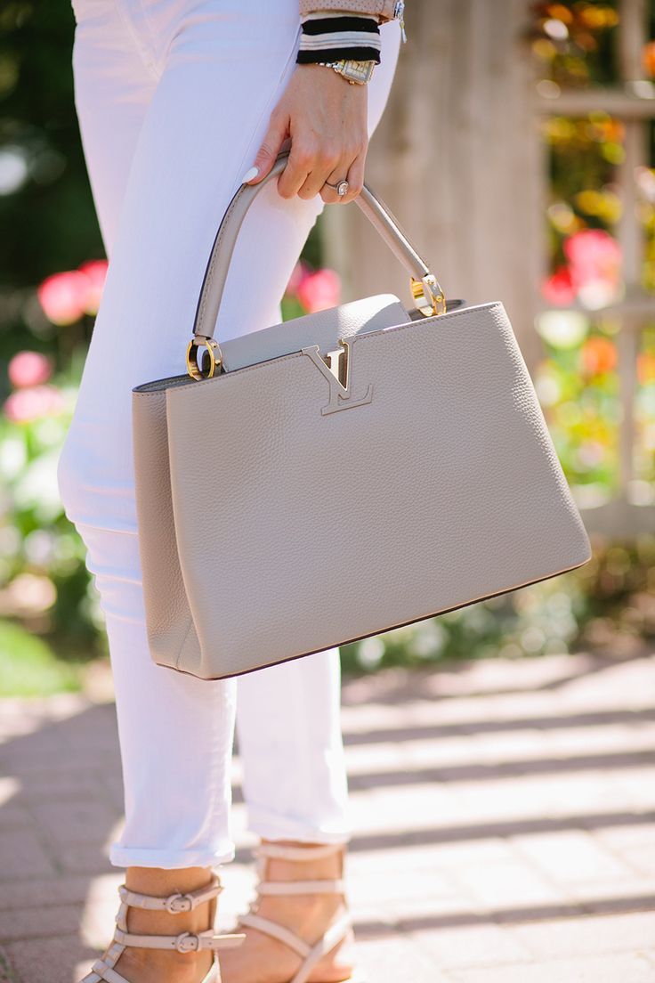 Neutral gray handbag from Louis Vuitton. Awesome handbag inspiration, pin now!