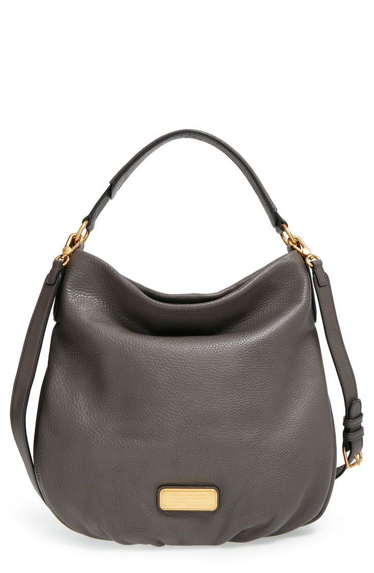This slouchy hobo bag is definitely an essential with its adjustable strap and r...