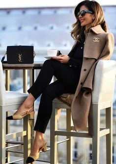 Love the Chanel pin and the black and beige.  Oh and the YSL bag...oops missed i...