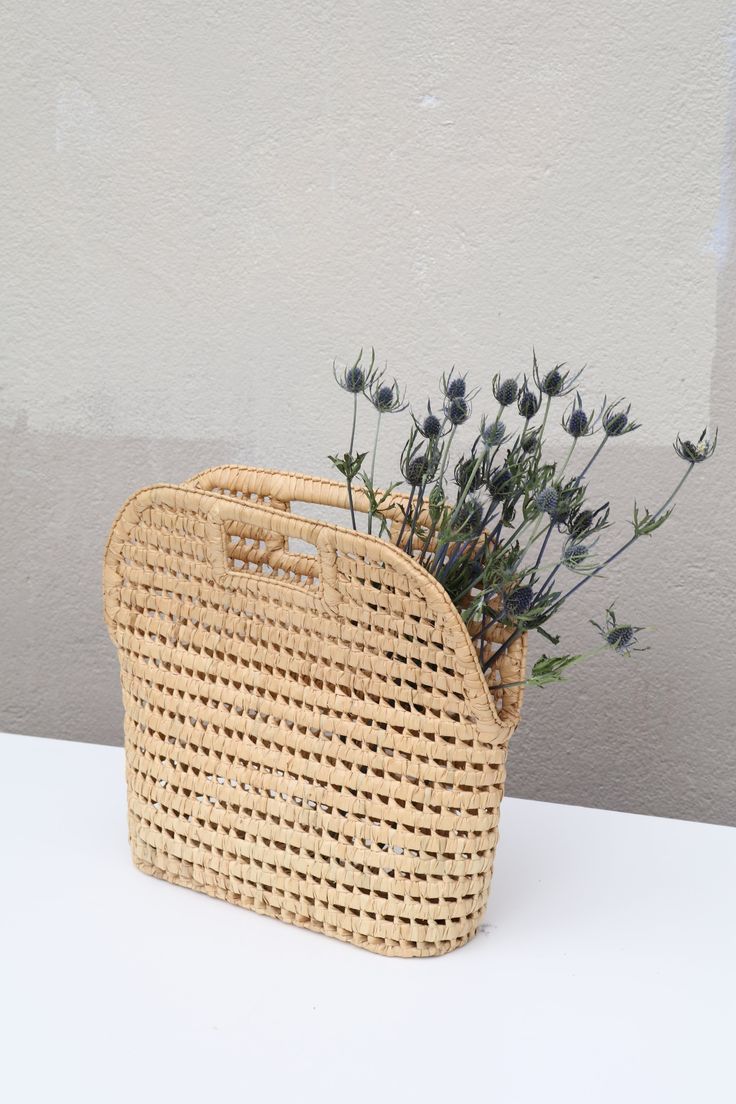 Vintage straw woven basket bag with a stiff, structural shape. Good ...