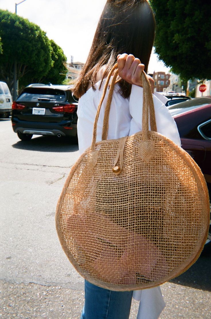 Say hello to perfect summer bag! Take this straw tote to the beach, farmers mark...