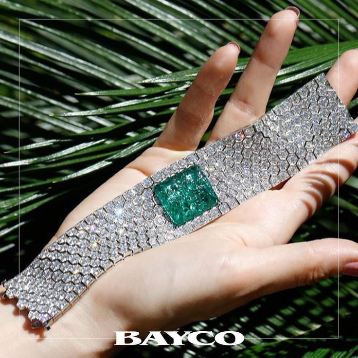 Bayco Jewels on Instagram: “A rare carved emerald is surrounded by white diamo...