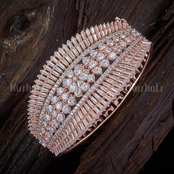 Designer zircon kada studded with synthetic stones, plated with gold polish and ...
