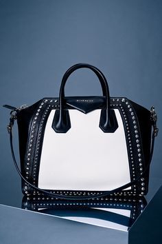 Bold and audacious. Own the moment with #Givenchy handbags.