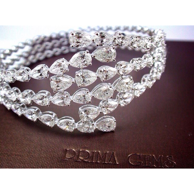 This gorgeous pear-shaped diamond bangle is unique and sophisticated #PrimaGems ...