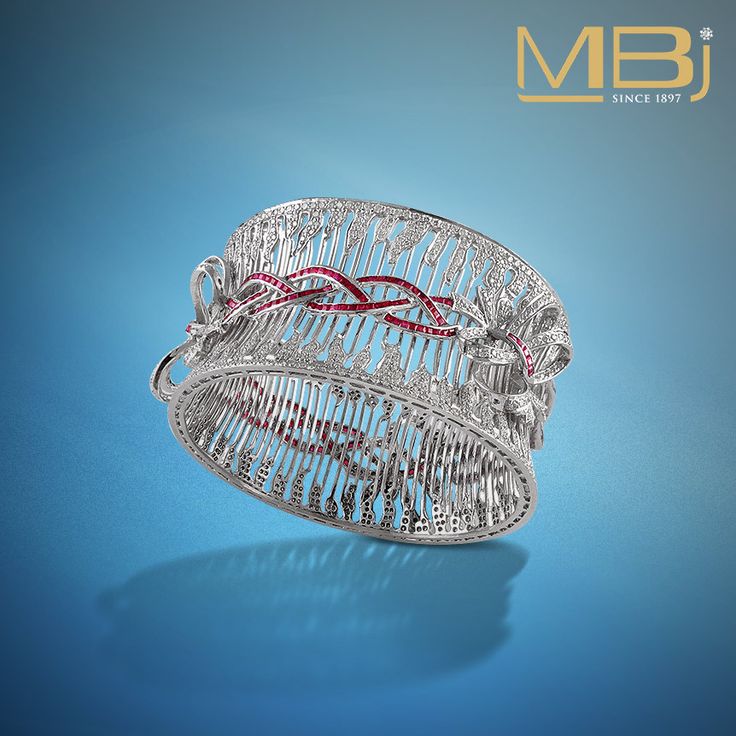 Diamond bracelet with round shaped diamonds and rubies. #diamond #ruby #fashion ...