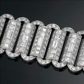 Impeccable white diamonds totaling 44.20 carats dazzle in this Tiffany & Co. bra...