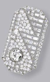 DIAMOND BRACELET, CIRCA 1930 The flexible band composed of three articulated ope...