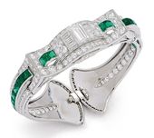 An Art Deco Emerald, Diamond and Platinum Bangle Bracelet, Oscar Heyman, circa 1...