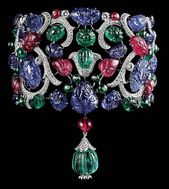 //Cartier. Platinum, carved emeralds, rubies and sapphires, brilliants